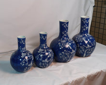Load image into Gallery viewer, Blue Globe Vase with White Floral Decal